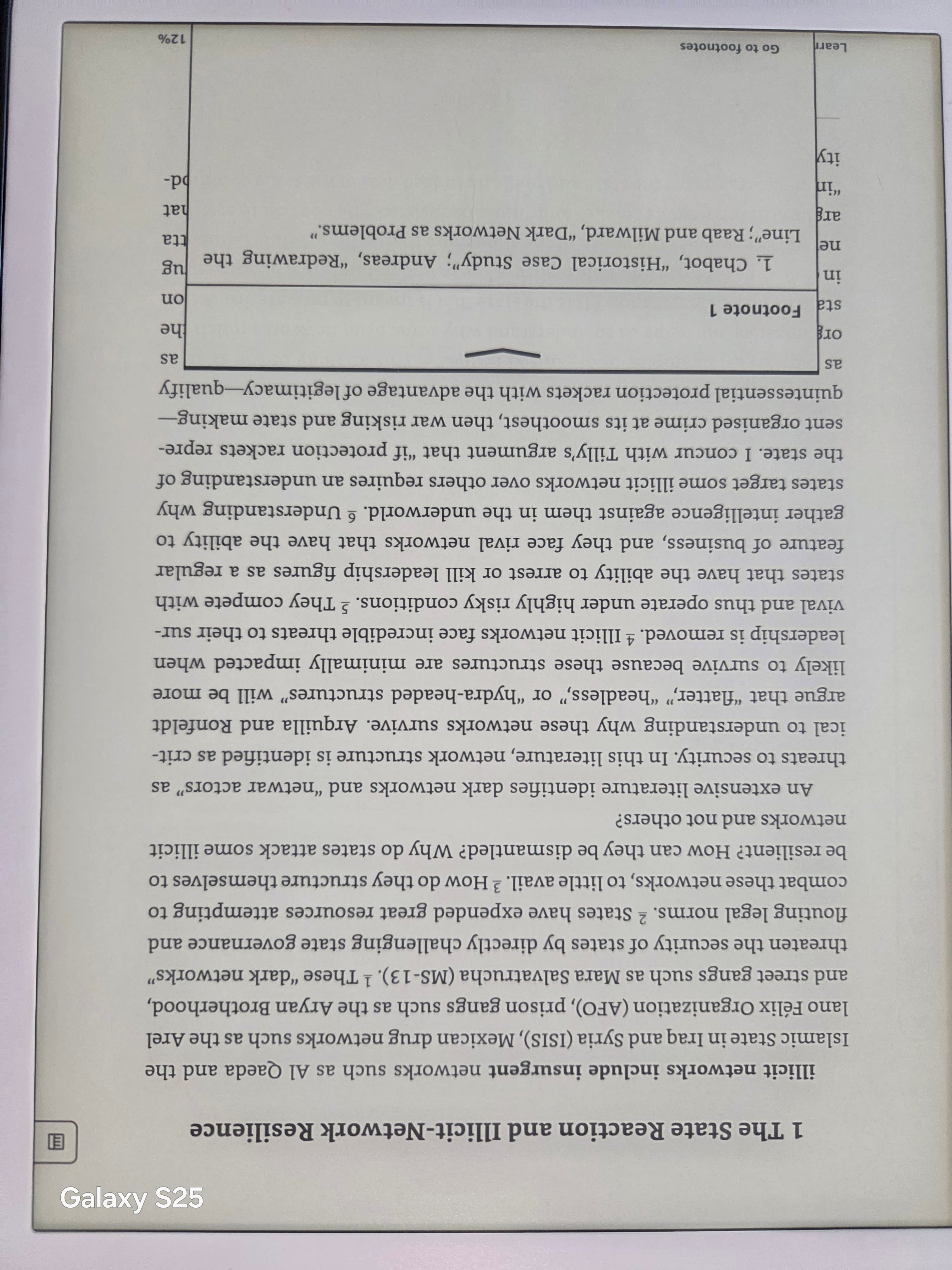Kindle Scribe showing a body paragraph from Mexico's Illicit Drug Networks Chapter 1 with a footnote popup open as an overlay, displaying the citation text for footnote 1.